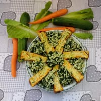 Rice with spinach and plumcake on vegetables