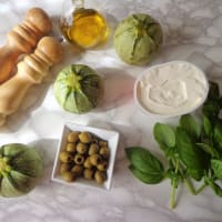 Zucchini stuffed with cheese to the olives and herbs step 1