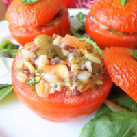 Tomatoes stuffed with cereal, feta and olives