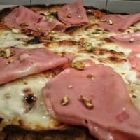 Mortadella pizza and pistachios