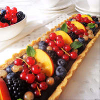 Coconut tart with chocolate cream and fresh fruit Coconut tart with chocolate cream and fresh fruit