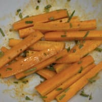 Sticks of baked carrots in the oven step 2