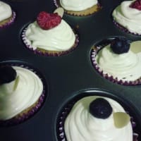 Cup cakes with red berries