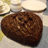 Sweet chocolate cake and raspberries