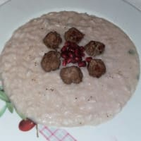 Pomegranate risotto, sausage and zola