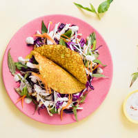 Crispy pancakes with chicken and asian salad