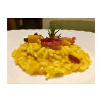 Carnaroli rice with pumpkin, saffron and crispy speck