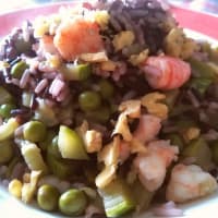 Venus rice with shrimp, peas, zucchini and walnuts