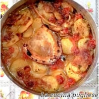 Baked Cuttlefish With Tomatoes And Potatoes