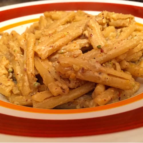 Homemade pasta with pistachio pesto