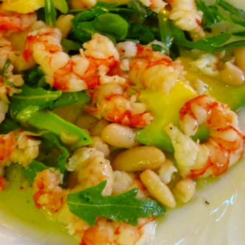 Prawns with avocado and pine nuts