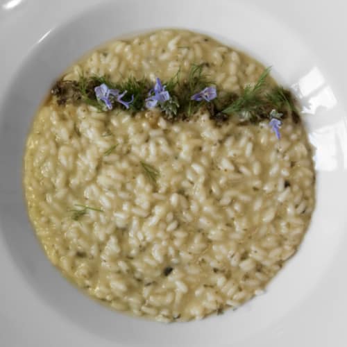 Risotto melanzane finocchietto e capperi essiccati