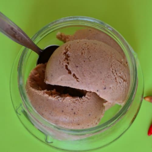 Chocolate ice cream, nuts and pepper