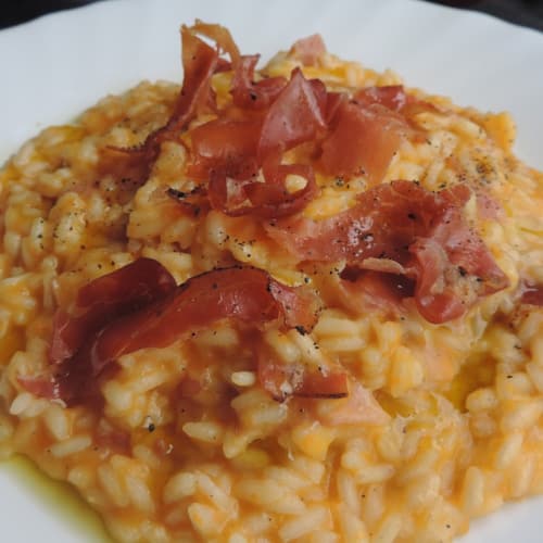 Pumpkin risotto with bacon and smoked cheese