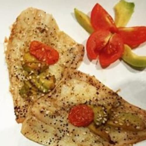 Fillets of plaice with avocado and tomatoes