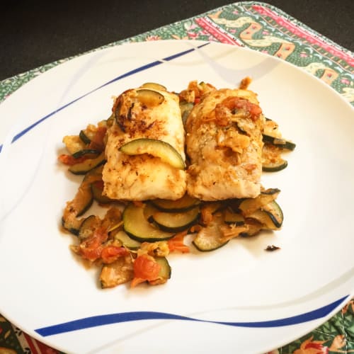 Pieces of African perch with Mediterranean zucchini