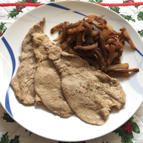 Slices of breast of veal with fennel and rosemary