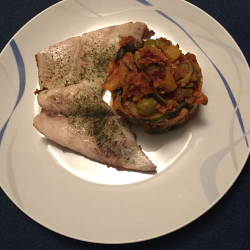 Pieces of African perch with Mediterranean zucchini