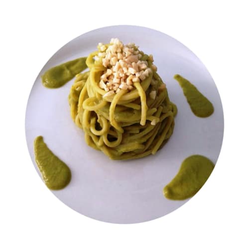 kamut spaghetti in cream of peas and chopped almonds