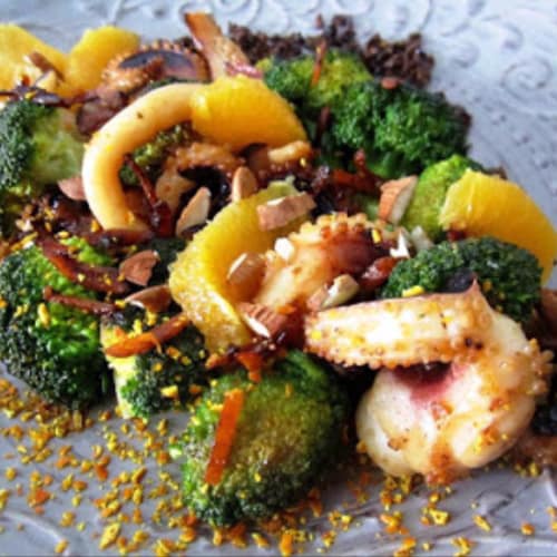 Ricci di seppia e broccoli all’arancia con mandorle e olive taggiasche