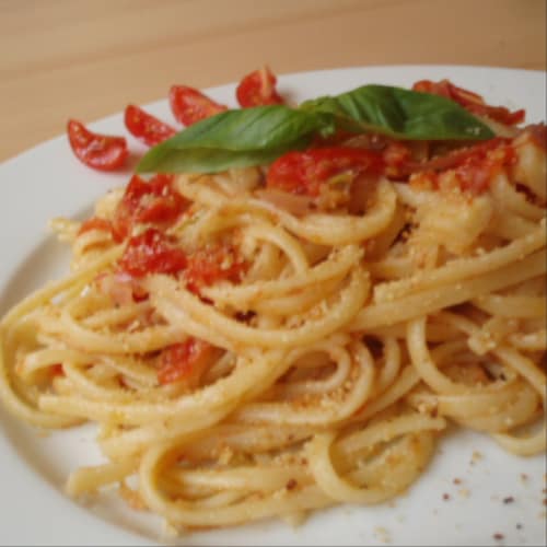 Linguini con tomates cherry gratinado