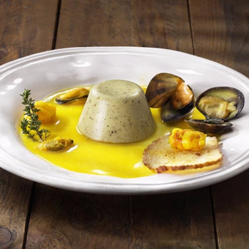 flan de calabacín con azafrán sopa del mar