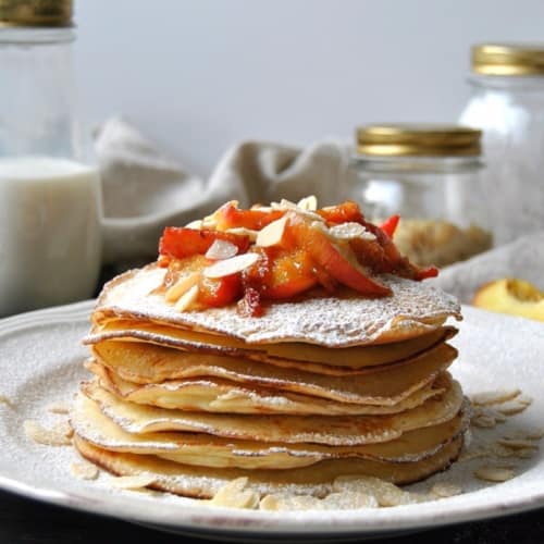 Pancakes with caramel peaches in marsala