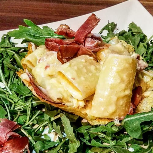 Paccheri con fondue Olandese e Speck in guscio di Parmigiano.