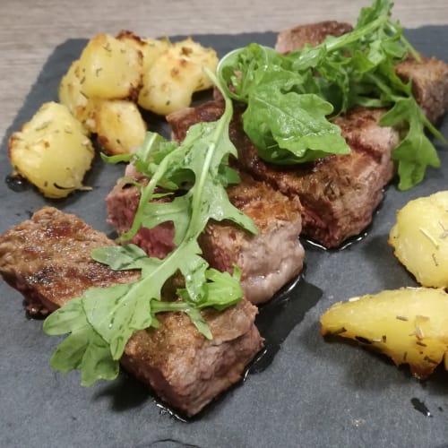 Tagliata con patate e rucola