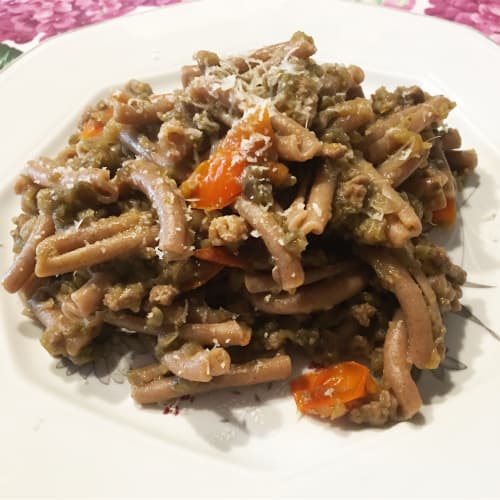 Spelled pasta and broad beans with aubergines