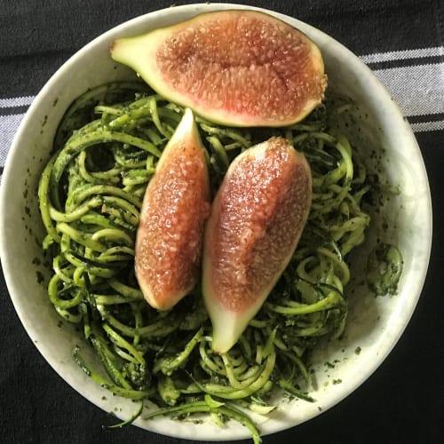 Zoodels uncooked spaghetti with pesto and fioroni