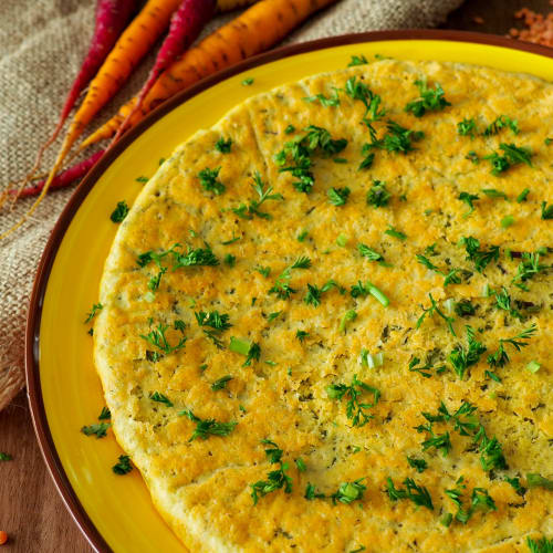 Red lentil porridge and carrot tufts