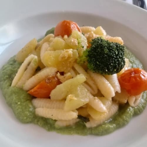 Sardinian Gnocchetti With Potatoes And Cherry Tomatoes On Broccoli Cream