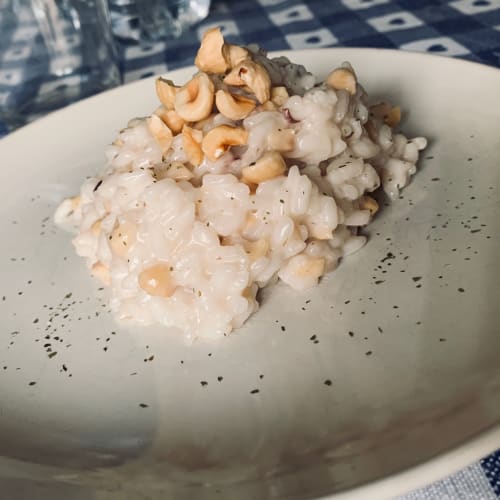 Risotto de robiola, stracchino y avellanas