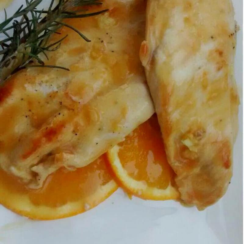 Chicken breast on orange cream