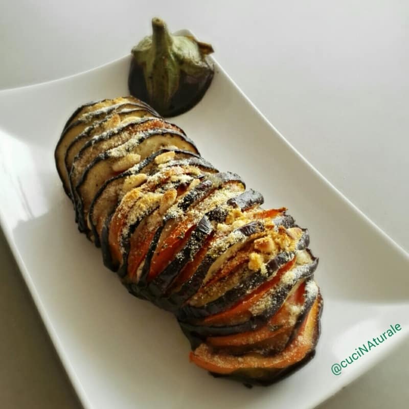 Book eggplant flavored with basil pesto and walnuts