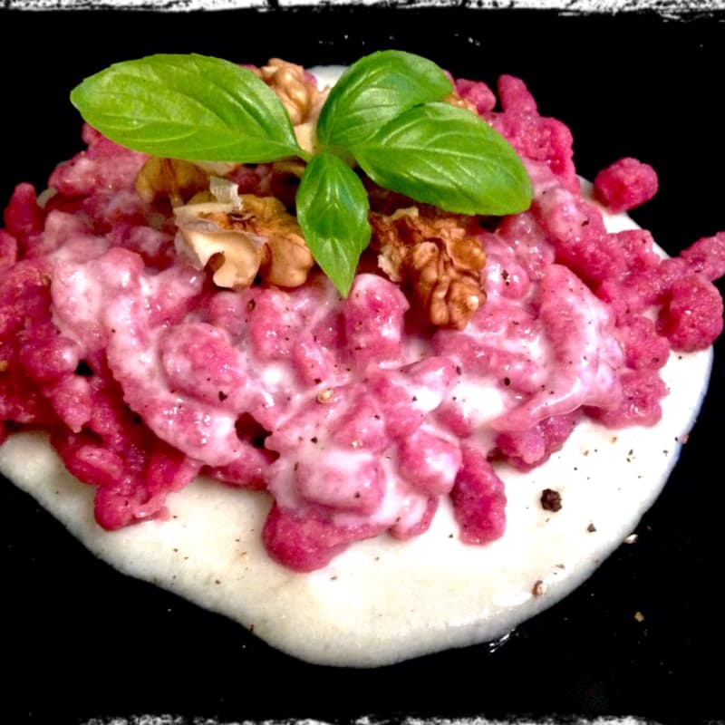 Spatzle beet with Taleggio cheese fondue and nuts