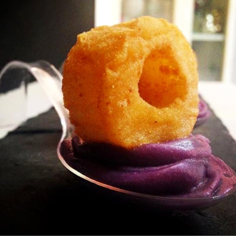 Fried squid rings on purple potato puree