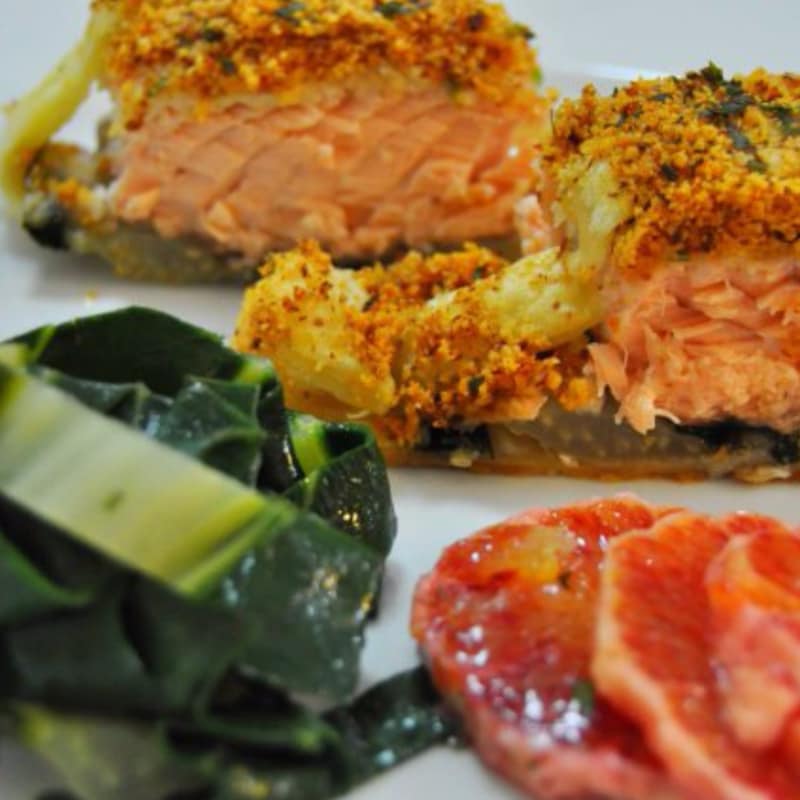 Crusted salmon spiced almonds on bed of chard