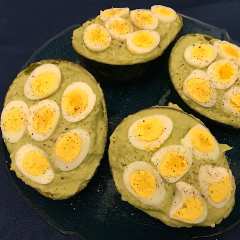 Avocado with tuna and eggs