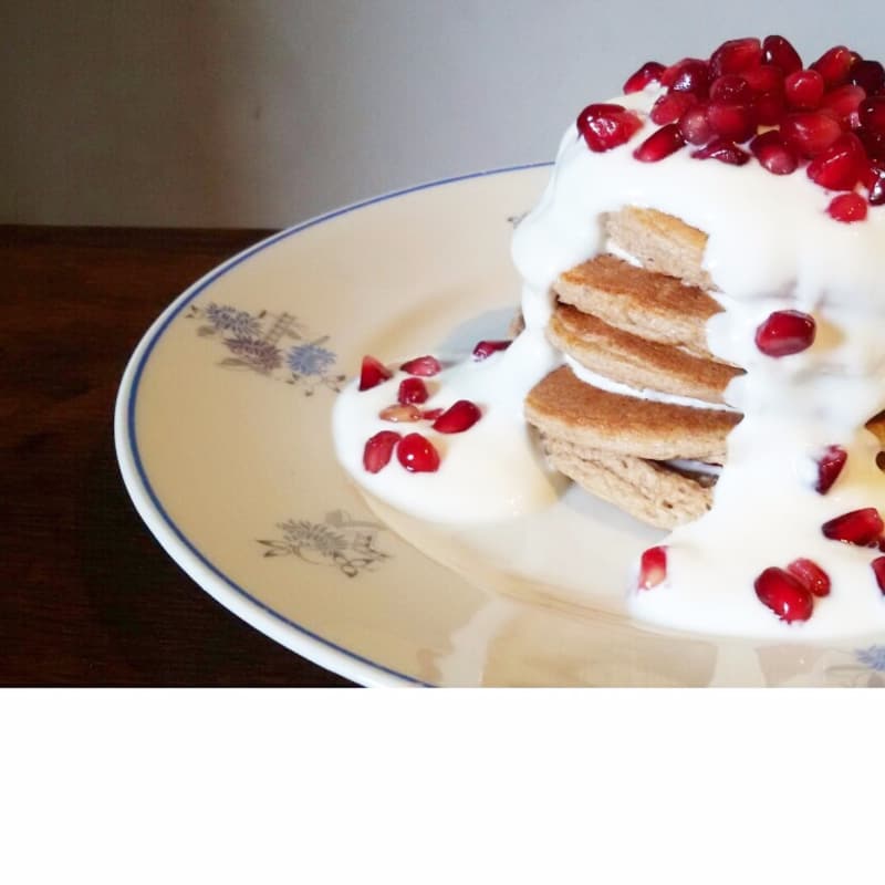 Pancakes with greek yogurt and pomegranate seeds