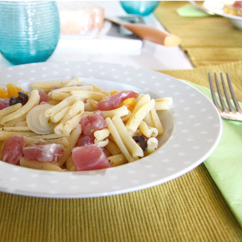 Pasta tuna and olives with orange scent