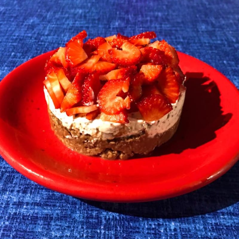 Light cheesecake with chocolate, strawberry and stracciatella