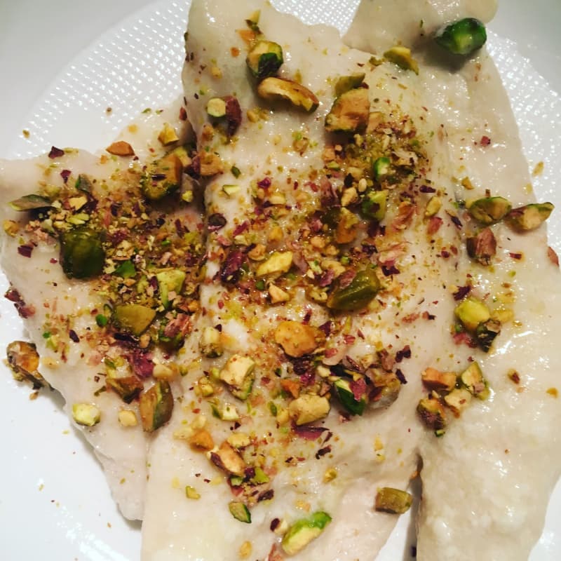 Milk chicken breast with pistachio grain