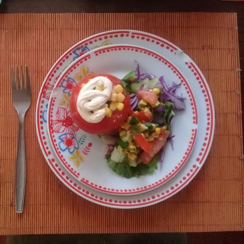 Tomato stuffed with farm salad