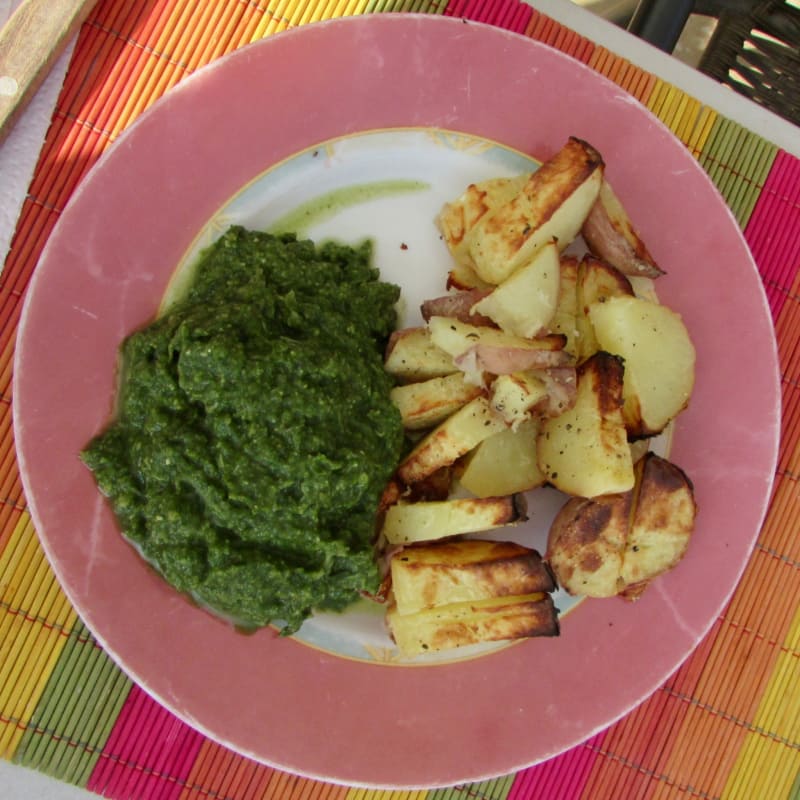 Baked potatoes with chard hummus