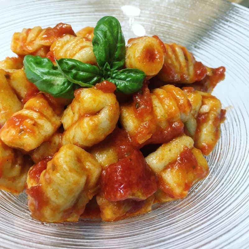 Ricotta and basil dumplings with fresh tomato