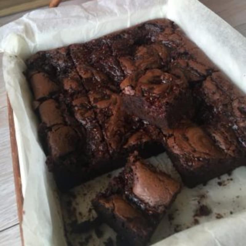 Chocolate brownies and raspberries