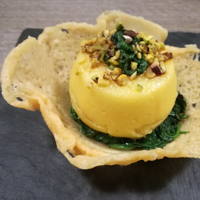 Parmesan basket with spinach bed and polenta pie