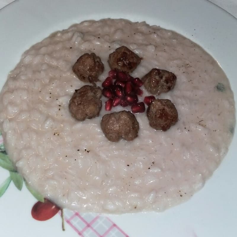 Risotto melograno, salsiccia e zola